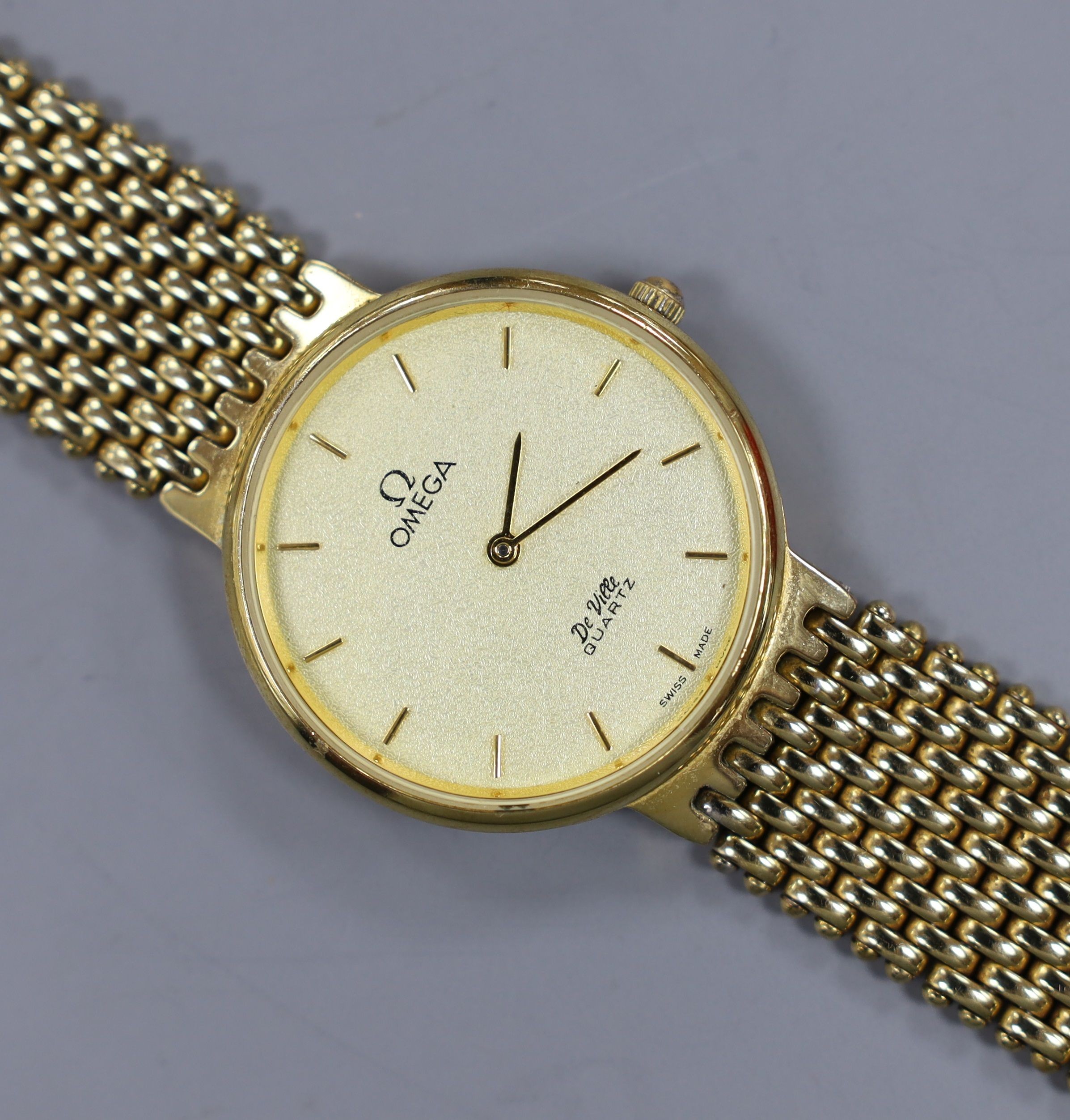 A gentleman's steel and gold plated Omega De Ville quartz wrist watch.